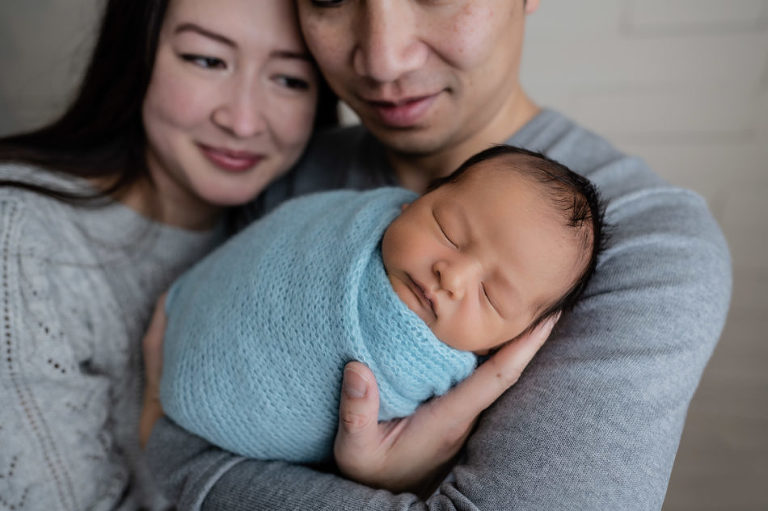 parent with newborn photo